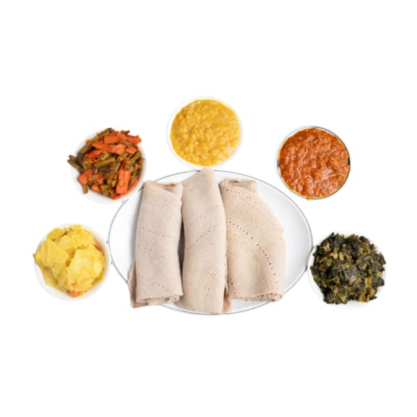 Three injera rolls on a plate surrounded by five bowls of colorful Ethiopian stews and vegetables.